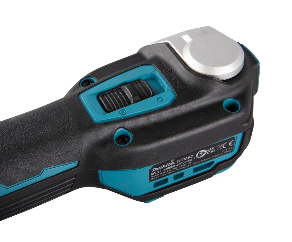 A teal and black Makita cordless power tool, 18V, with an ergonomic grip, designed for use on construction and maintenance tasks.