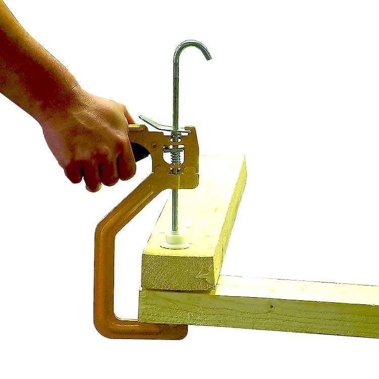 A Roughneck clamp with an adjustable jaw and a screw-tightening mechanism, for holding workpieces in position during cutting, drilling, or bonding.