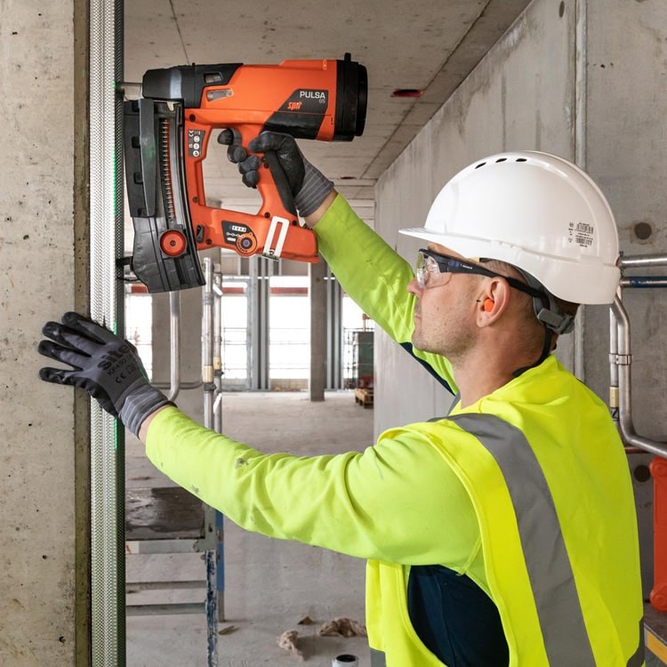 Spit Pulsa 65 Gas Nailer In Use on Site