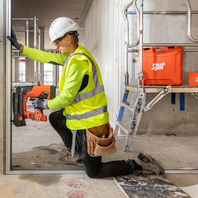 Spit Pulsa 65 Gas Nailer In Use on Site