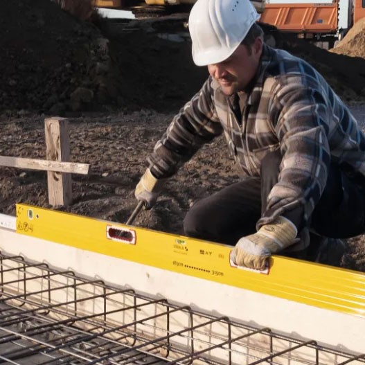 A Stabila 376cm spirit level with an extruded aluminium body and accurate vials, for checking horizontal and vertical alignment.