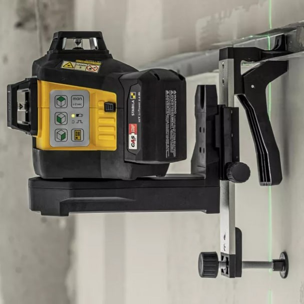 A Stabila self-levelling laser level projecting horizontal and vertical lines, for precision alignment and setting-out work.