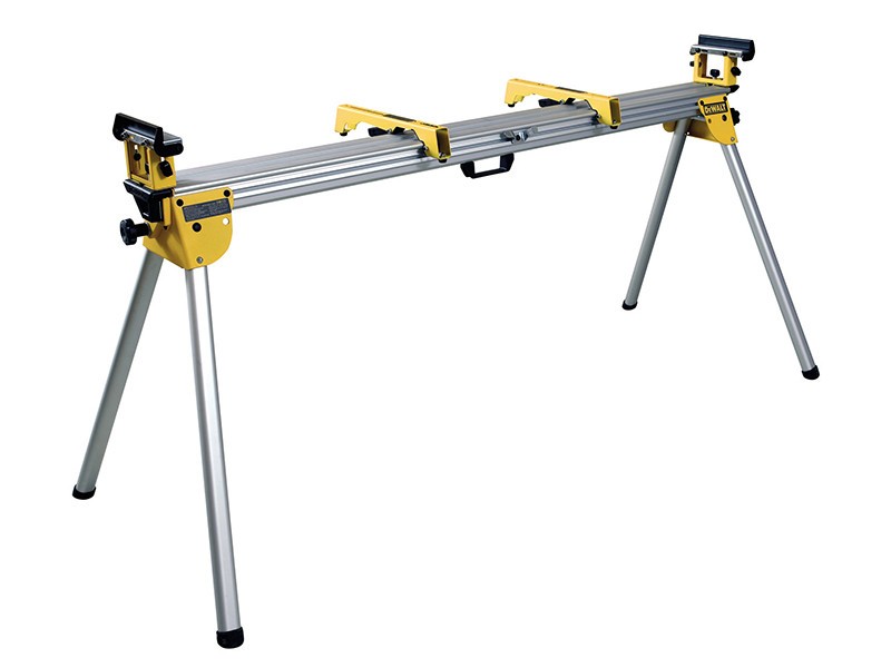 A silver and yellow metal miter saw stand with four foldable legs and adjustable mounts, designed to support woodworking tools.
