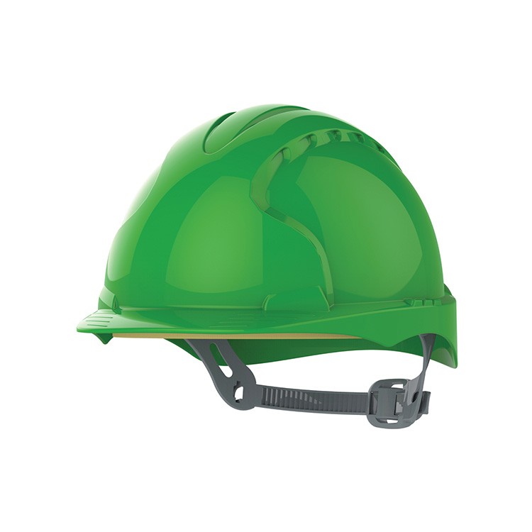 A green safety helmet with an adjustable suspension harness and ventilation slots, providing impact protection on construction sites.