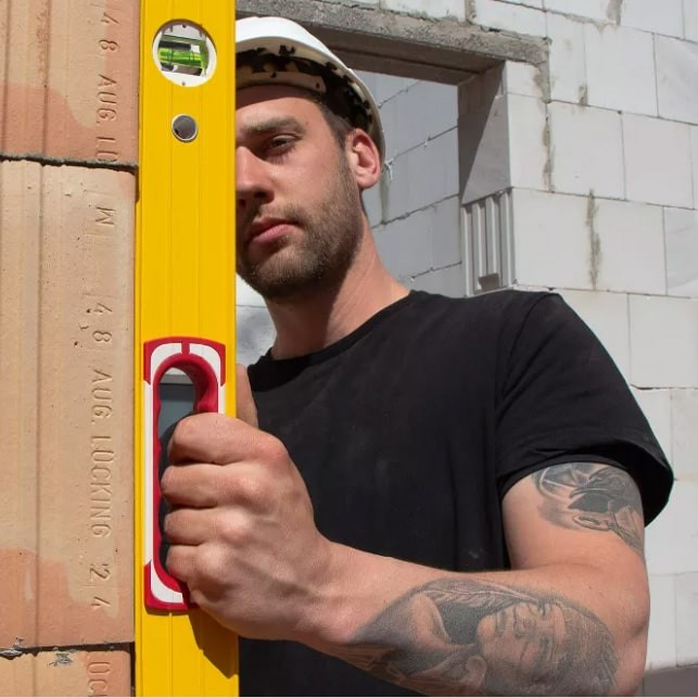 A Stabila 200cm spirit level with an extruded aluminium body and accurate vials, for checking horizontal and vertical alignment.