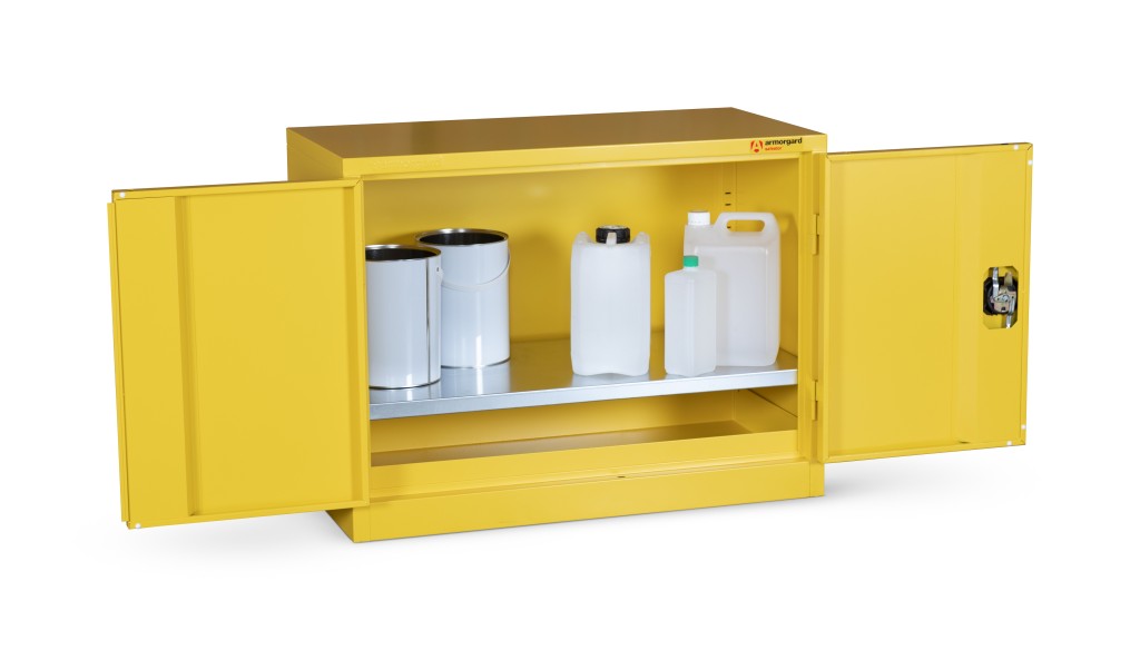A steel Armorgard lockable flammable-liquids storage cabinet with double doors and sump containment, for safely storing hazardous substances on site.