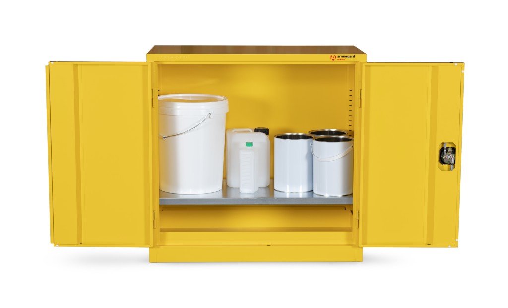 A steel Armorgard lockable flammable-liquids storage cabinet with double doors and sump containment, for safely storing hazardous substances on site.