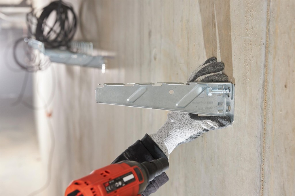 A metal concrete screw anchor with a hex head with a partially threaded shaft and a drill point tip, designed for direct fixing into pre-drilled holes in concrete or masonry.