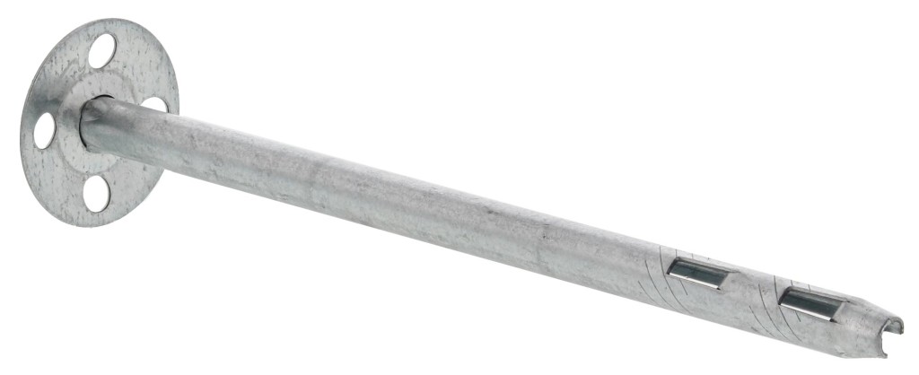 A metal insulation fixing pin with a round perforated plate at one end and a long, hollow shaft featuring two rectangular slots near the pointed tip.