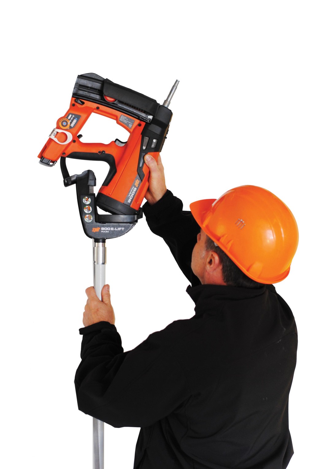An orange and black Spit cordless power tool, with an ergonomic grip, designed for use on construction and maintenance tasks.