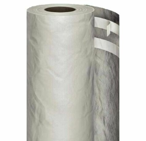 A large roll of white building material with a slightly textured surface and a partially unrolled section showing a darker underside and adhesive strips.,