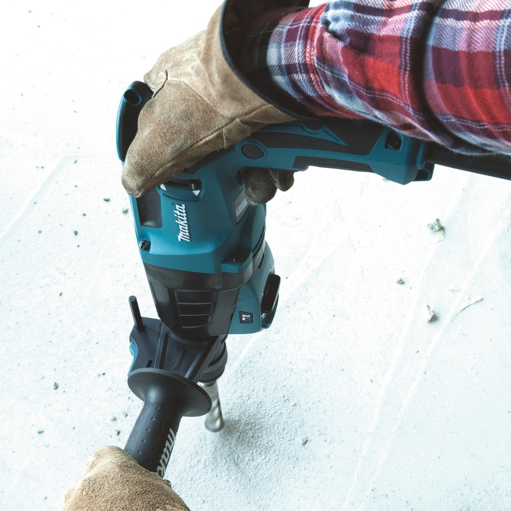 A teal and black Makita cordless SDS-Plus rotary hammer drill with 110V hammer, rotation, and chisel modes, for drilling and chiselling into concrete and masonry.