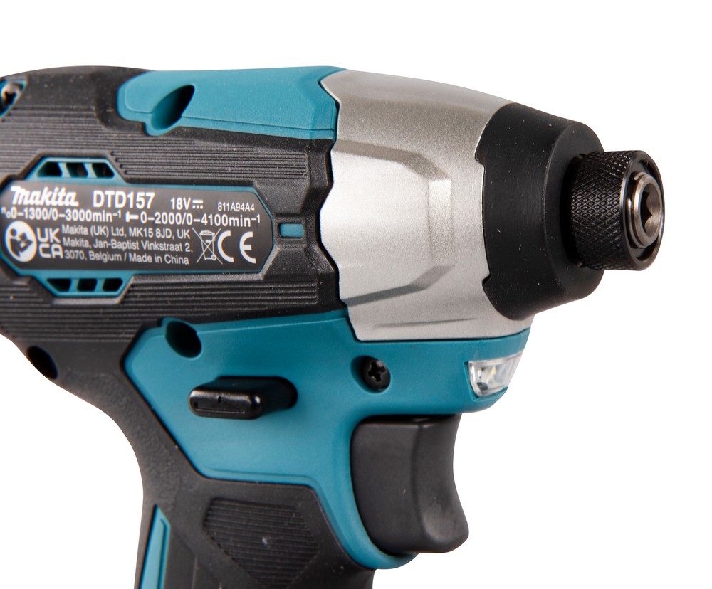 A teal and black Makita cordless impact driver with a 18V motor, a hex-chuck, and variable speed, for high-torque screw driving and fastening.