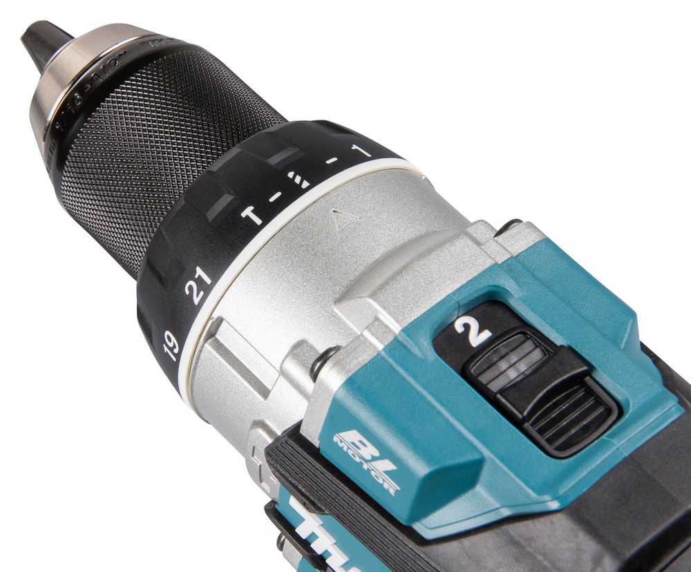 A teal and black Makita cordless combi drill with an 18V motor, a 13mm keyless chuck, and hammer, drill, and screwdriver modes.