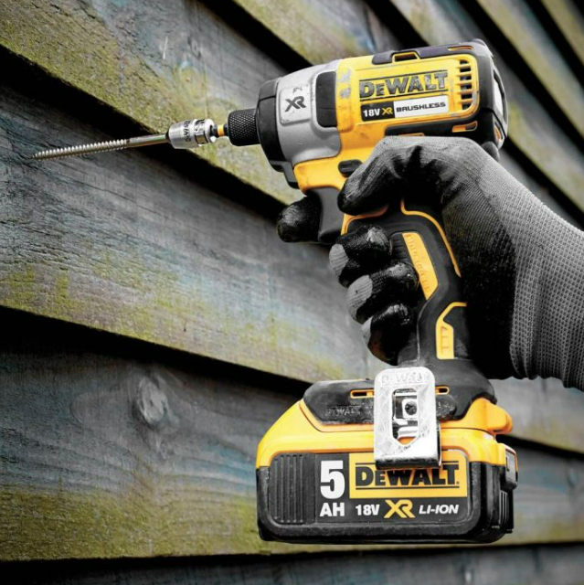 A yellow and black DEWALT cordless combi drill with an 18V motor, a 13mm keyless chuck, and hammer, drill, and screwdriver modes.