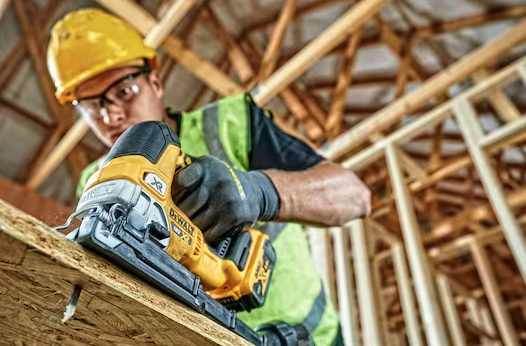 A yellow and black DEWALT cordless jigsaw with 18V orbital action and a variable-speed trigger, for cutting curves and internal shapes.