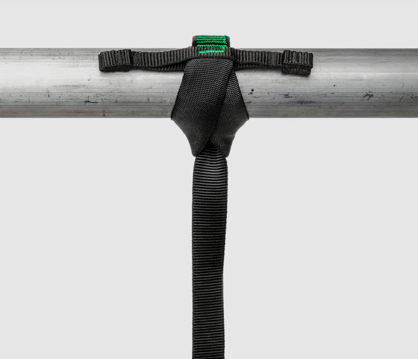 A fall-arrest safety harness or lanyard with energy-absorbing components, for working at height in compliance with safety regulations.
