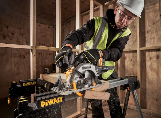 A yellow and black DEWALT cordless circular saw with a 18V motor, an adjustable bevel plate, and a blade guard, for ripping and cross-cutting timber.
