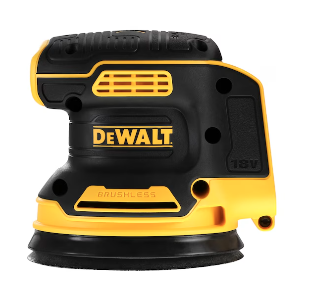 A yellow and black DEWALT cordless orbital sander with a 18V motor and a dust extraction bag, for surface preparation and finishing work.