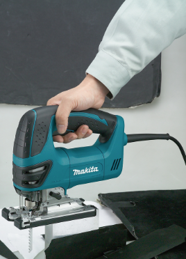 A teal and black Makita corded jigsaw with 240V orbital action and a variable-speed trigger, for cutting curves and internal shapes.