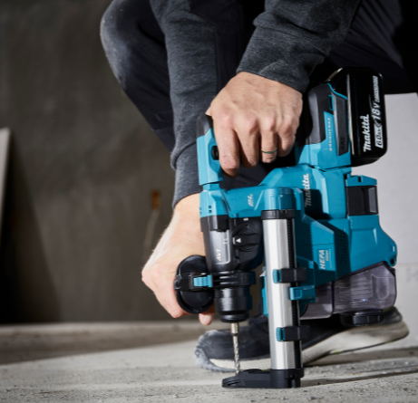 A teal and black Makita cordless SDS-Plus rotary hammer drill with 18V hammer, rotation, and chisel modes, for drilling and chiselling into concrete and masonry.