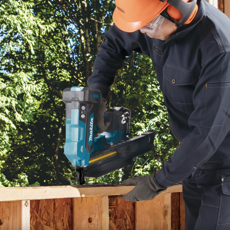 A teal and black Makita cordless framing nailer with 18V a 30–34° magazine, for driving collated nails into structural timber.