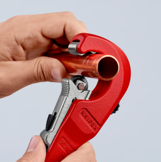 A pipe cutter with a hardened steel cutting wheel and an adjustable frame, for cleanly severing copper, steel, and plastic pipe.