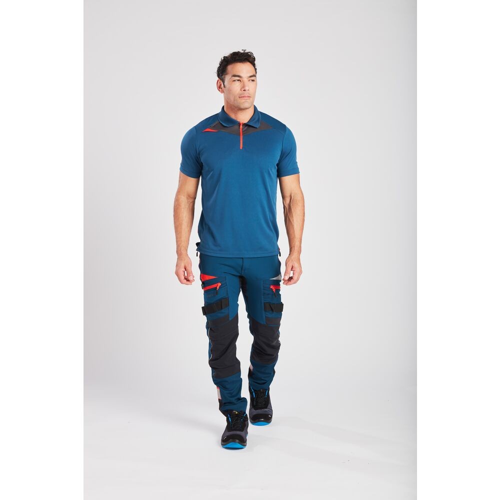 A blue polo shirt designed for use on construction sites and in industrial work environments.,
