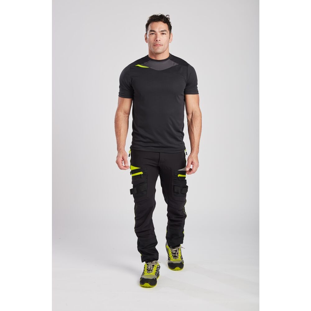 A black work shirt designed for use on construction sites and in industrial work environments.,