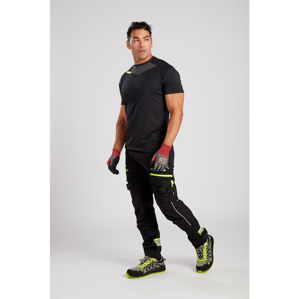 A black work shirt designed for use on construction sites and in industrial work environments.,