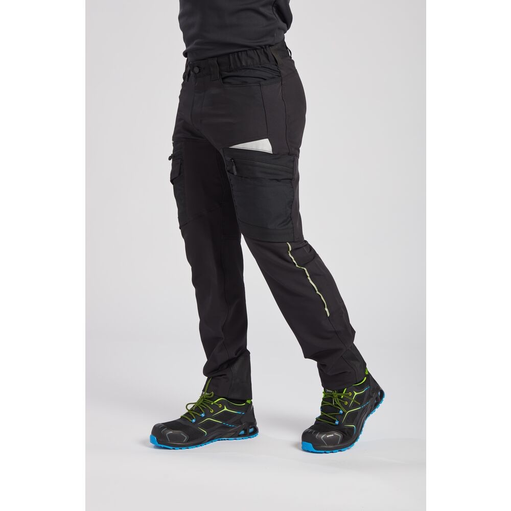 A pair of black work trousers designed for use on construction sites and in industrial work environments.,