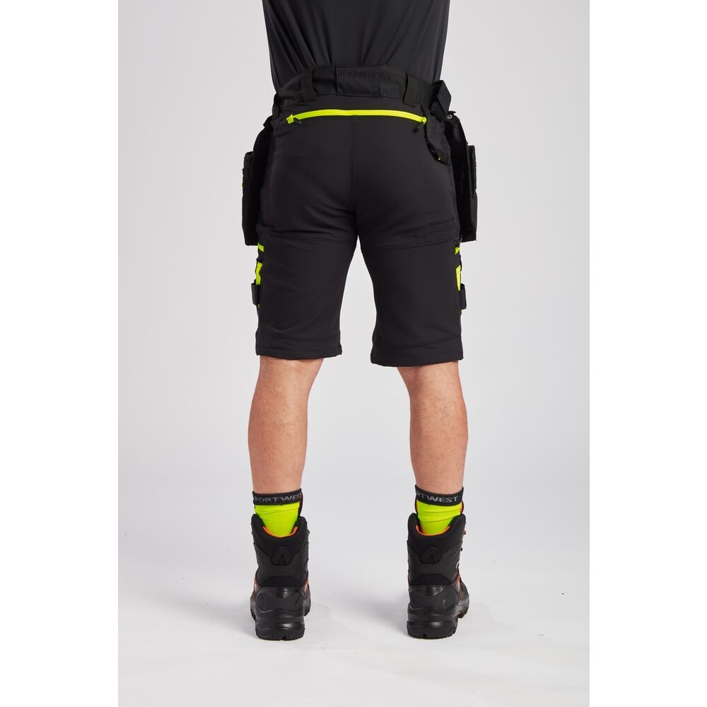 A black workwear garment featuring functional pockets, suitable for a wide range of outdoor and site work applications.