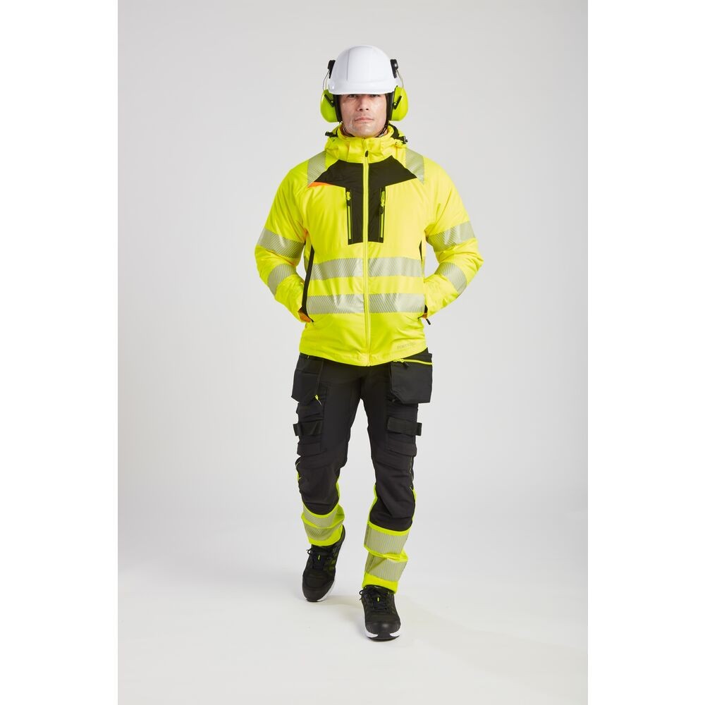 A high-visibility yellow jacket featuring retroreflective tape panels, suitable for a wide range of outdoor and site work applications.