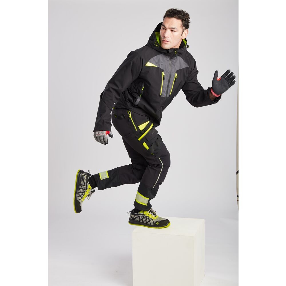 A black waterproof jacket designed for use on construction sites and in industrial work environments.,