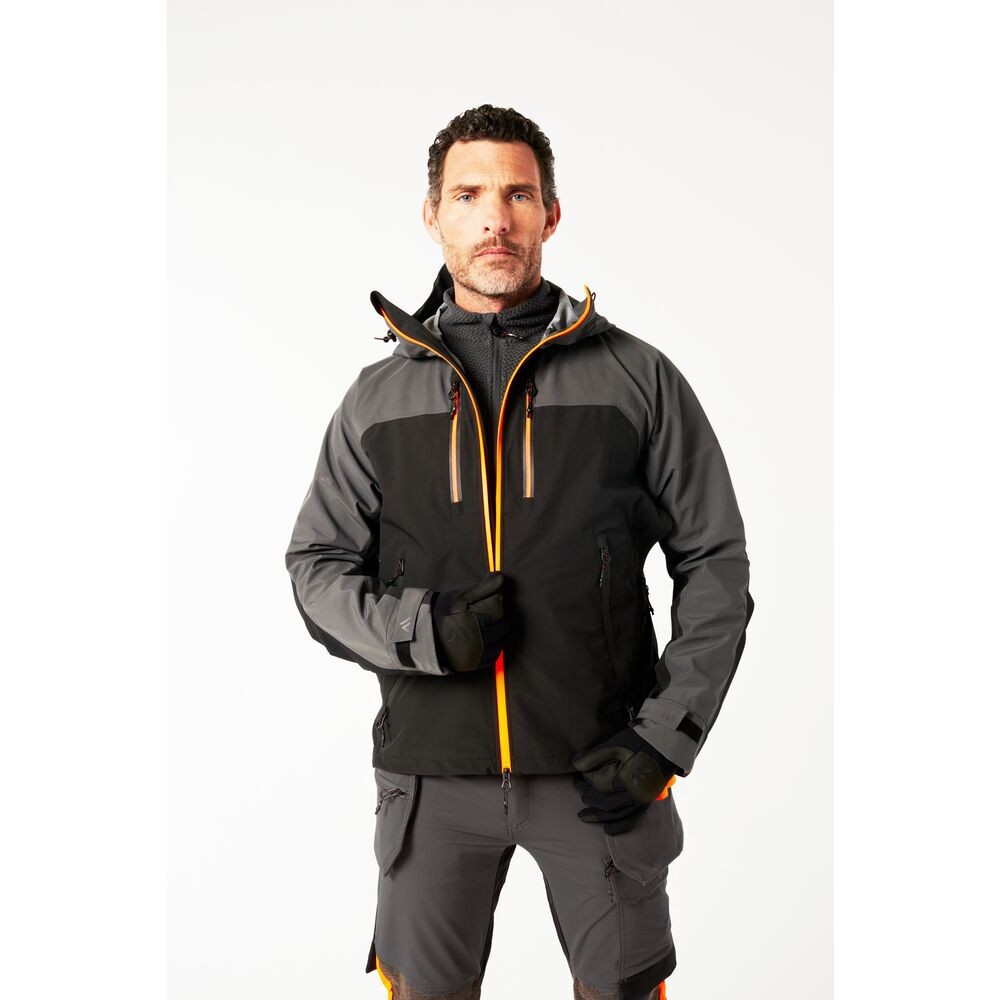 A grey jacket designed for use on construction sites and in industrial work environments.,