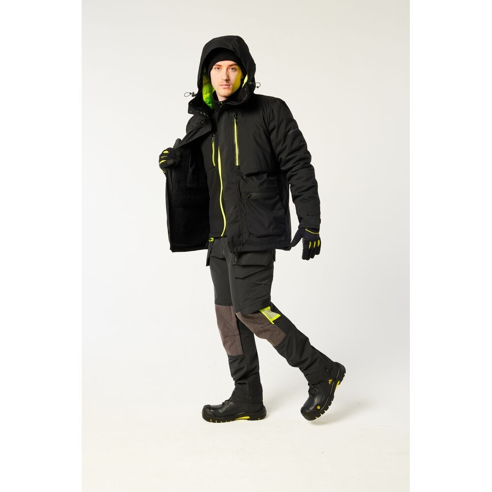 A black jacket designed for use on construction sites and in industrial work environments.,