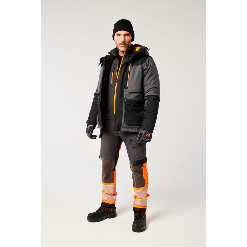 A grey jacket designed for use on construction sites and in industrial work environments.,