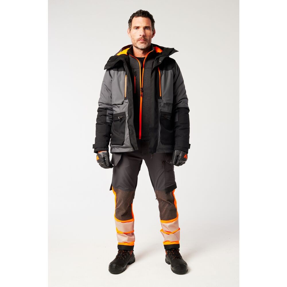 A grey jacket designed for use on construction sites and in industrial work environments.,
