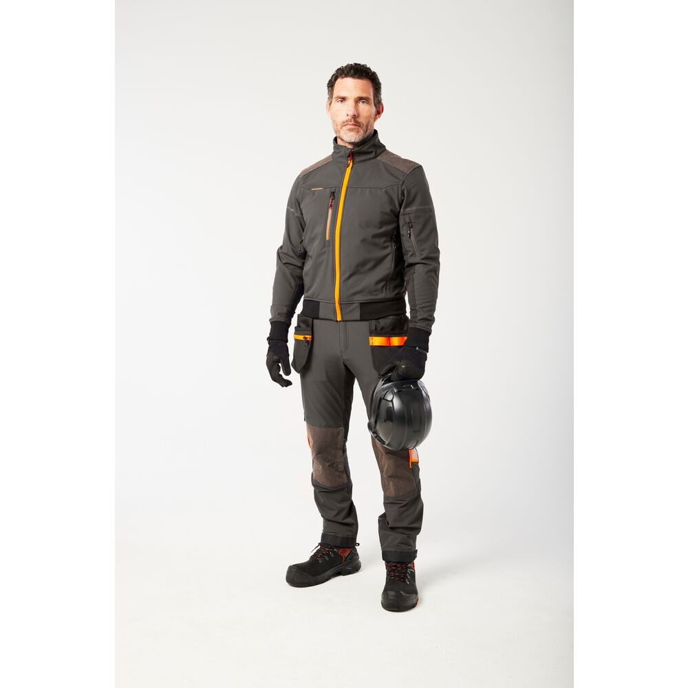 A grey softshell jacket designed for use on construction sites and in industrial work environments.,