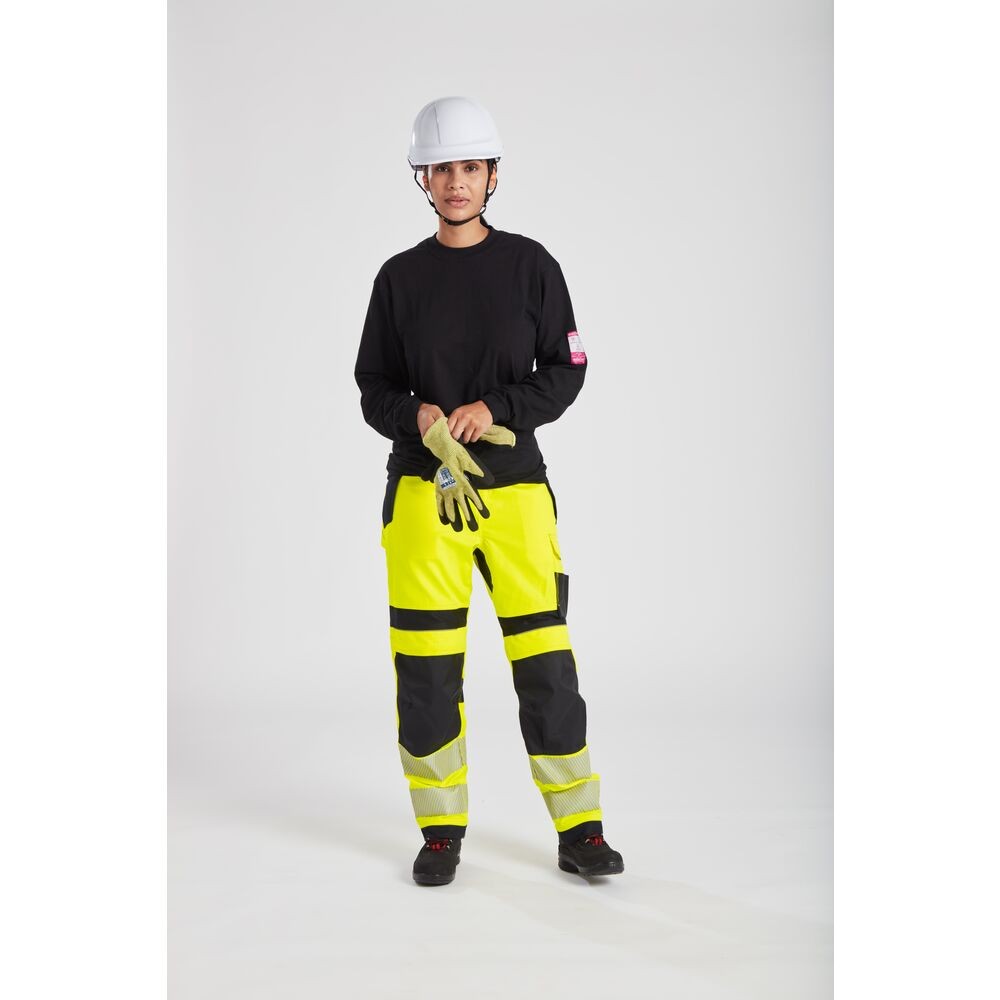 A black work shirt featuring flame-resistant fabric, suitable for a wide range of outdoor and site work applications.