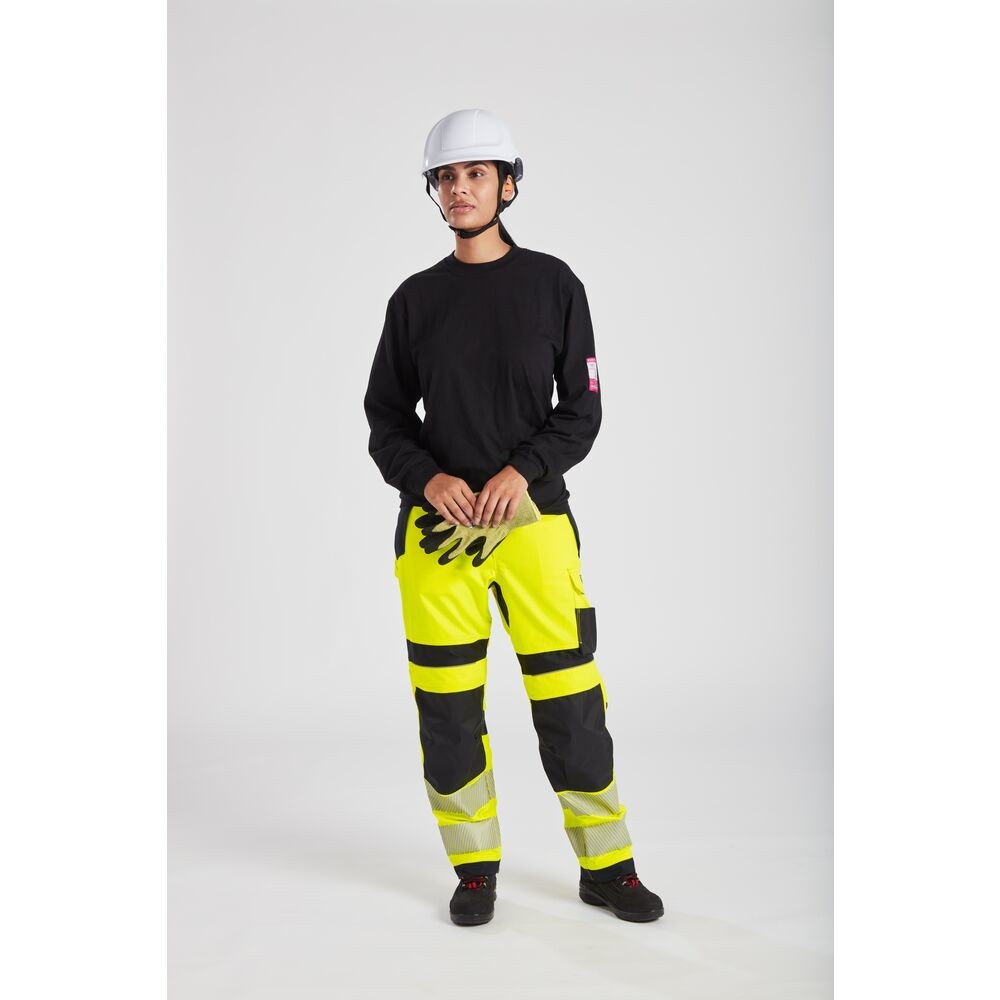 A black work shirt featuring flame-resistant fabric, suitable for a wide range of outdoor and site work applications.