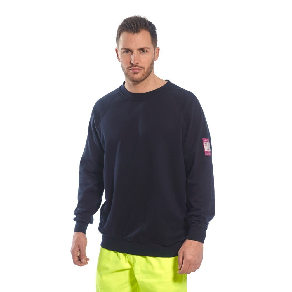 A black work shirt featuring flame-resistant fabric, suitable for a wide range of outdoor and site work applications.