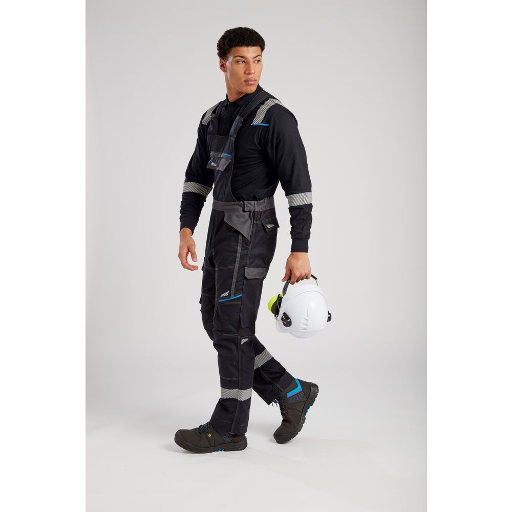 A black workwear garment featuring flame-resistant fabric, suitable for a wide range of outdoor and site work applications.