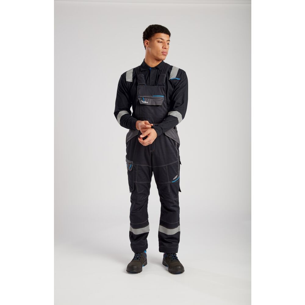 A black workwear garment featuring flame-resistant fabric, suitable for a wide range of outdoor and site work applications.