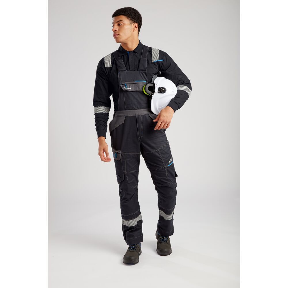 A black workwear garment featuring flame-resistant fabric, suitable for a wide range of outdoor and site work applications.