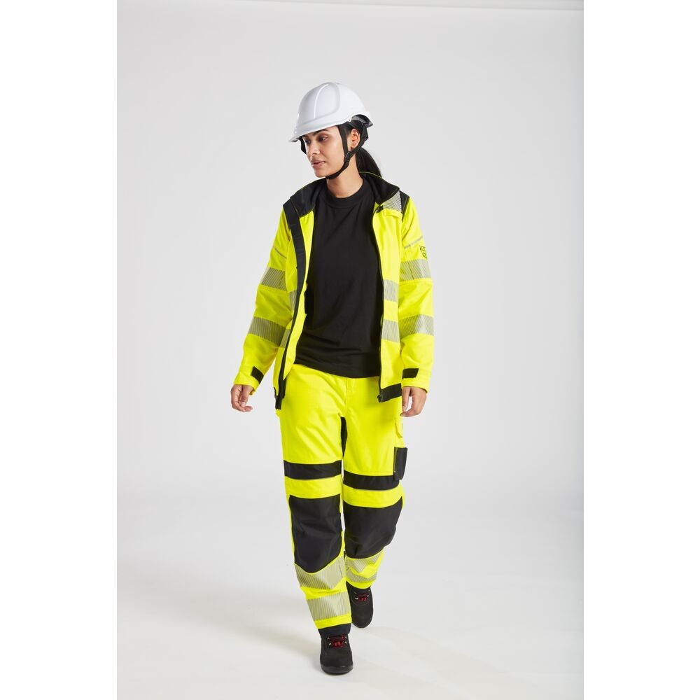 A pair of women's high-visibility yellow trousers featuring retroreflective tape panels, flame-resistant fabric, suitable for a wide range of outdoor and site work applications.