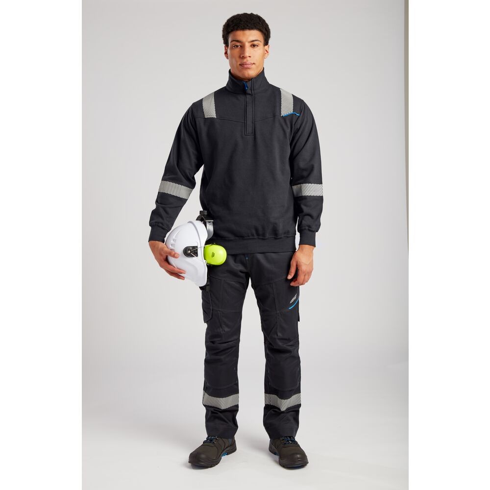 A black work shirt featuring a full-length zip front, flame-resistant fabric, suitable for a wide range of outdoor and site work applications.