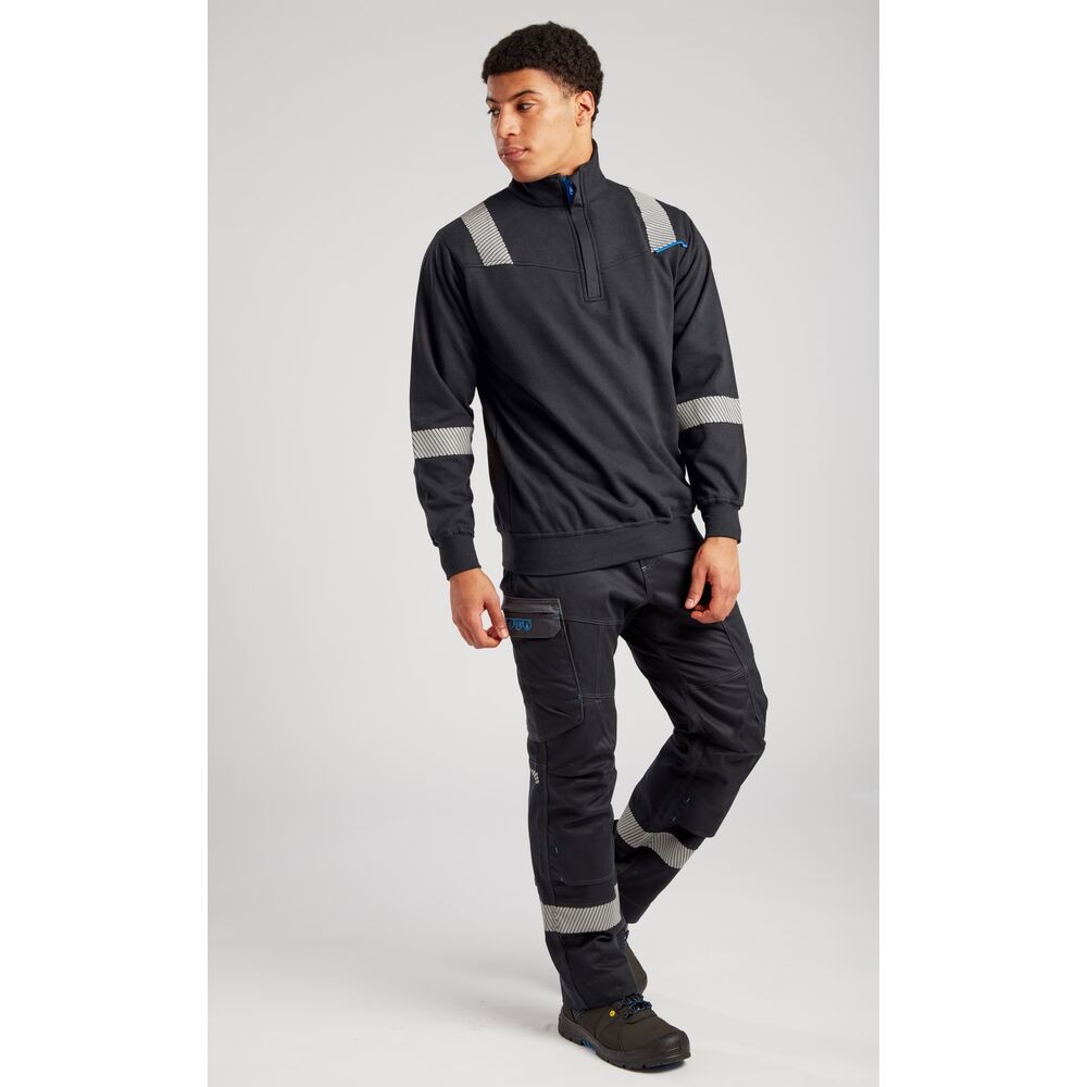 A black work shirt featuring a full-length zip front, flame-resistant fabric, suitable for a wide range of outdoor and site work applications.