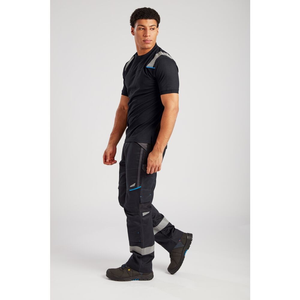 A black work shirt featuring flame-resistant fabric, suitable for a wide range of outdoor and site work applications.