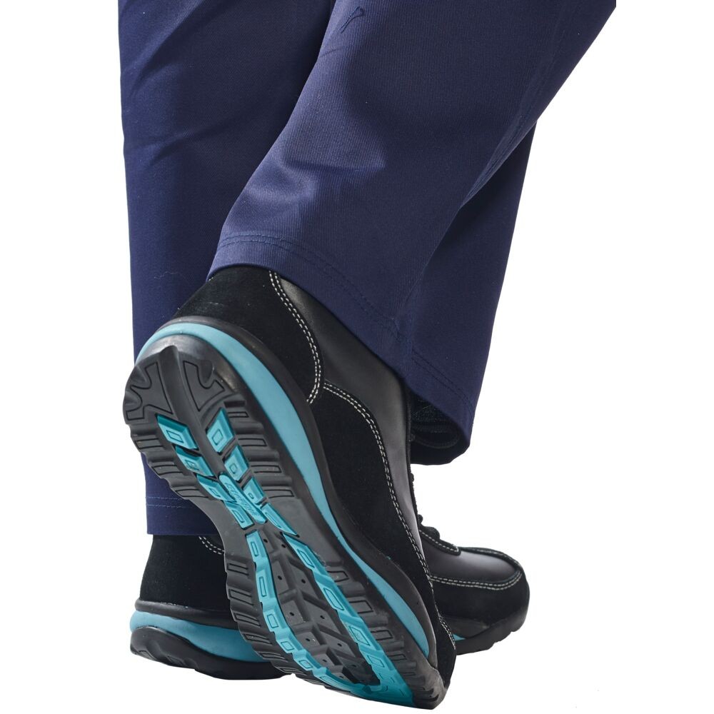 A black safety trainer with a composite toecap, a cushioned insole, and a lightweight anti-slip sole, suitable for lighter-duty site work.